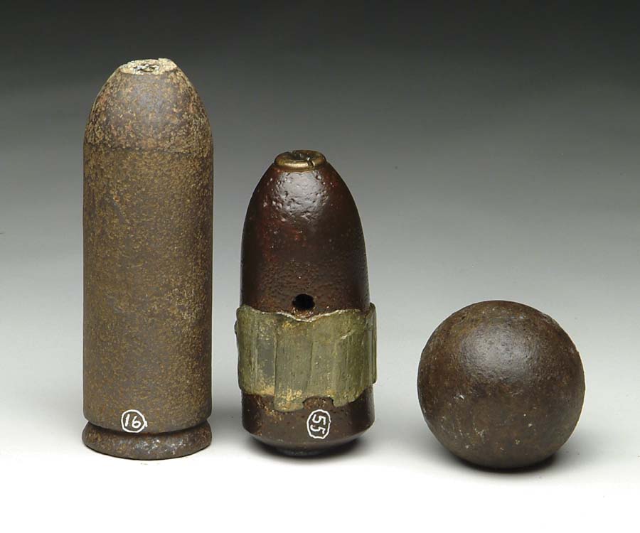 Appraisal: LOT OF THREE FIELD ARTILLERY PROJECTILES All excavated -pounder solid