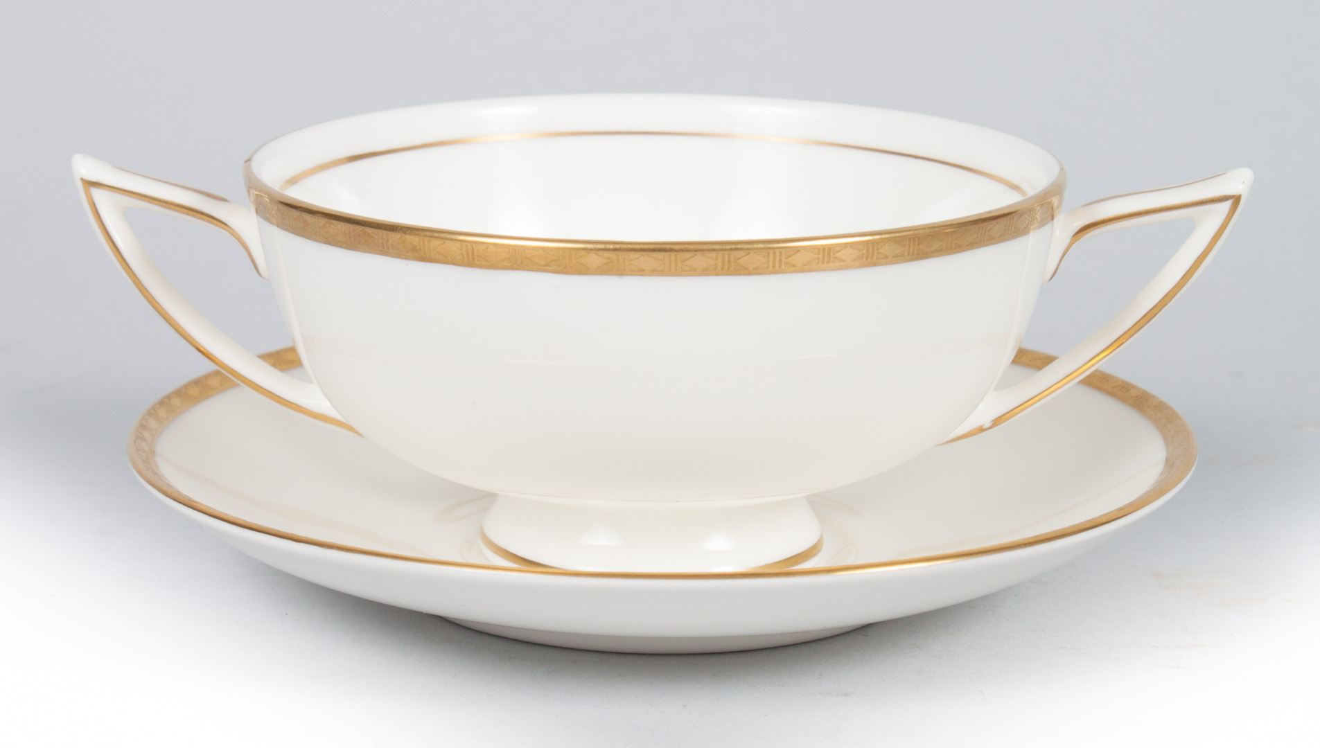 Appraisal: Minton china bouillon cups and saucers in the Golden Heritage