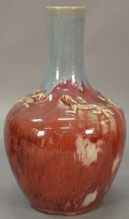 Appraisal: Chinese flambe glazed porcelain bottle vase red flambe body with