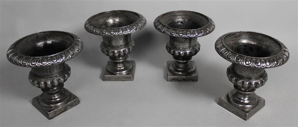 Appraisal: SET OF FOUR SMALL BURNISHED CAST IRON GARDEN URNS each