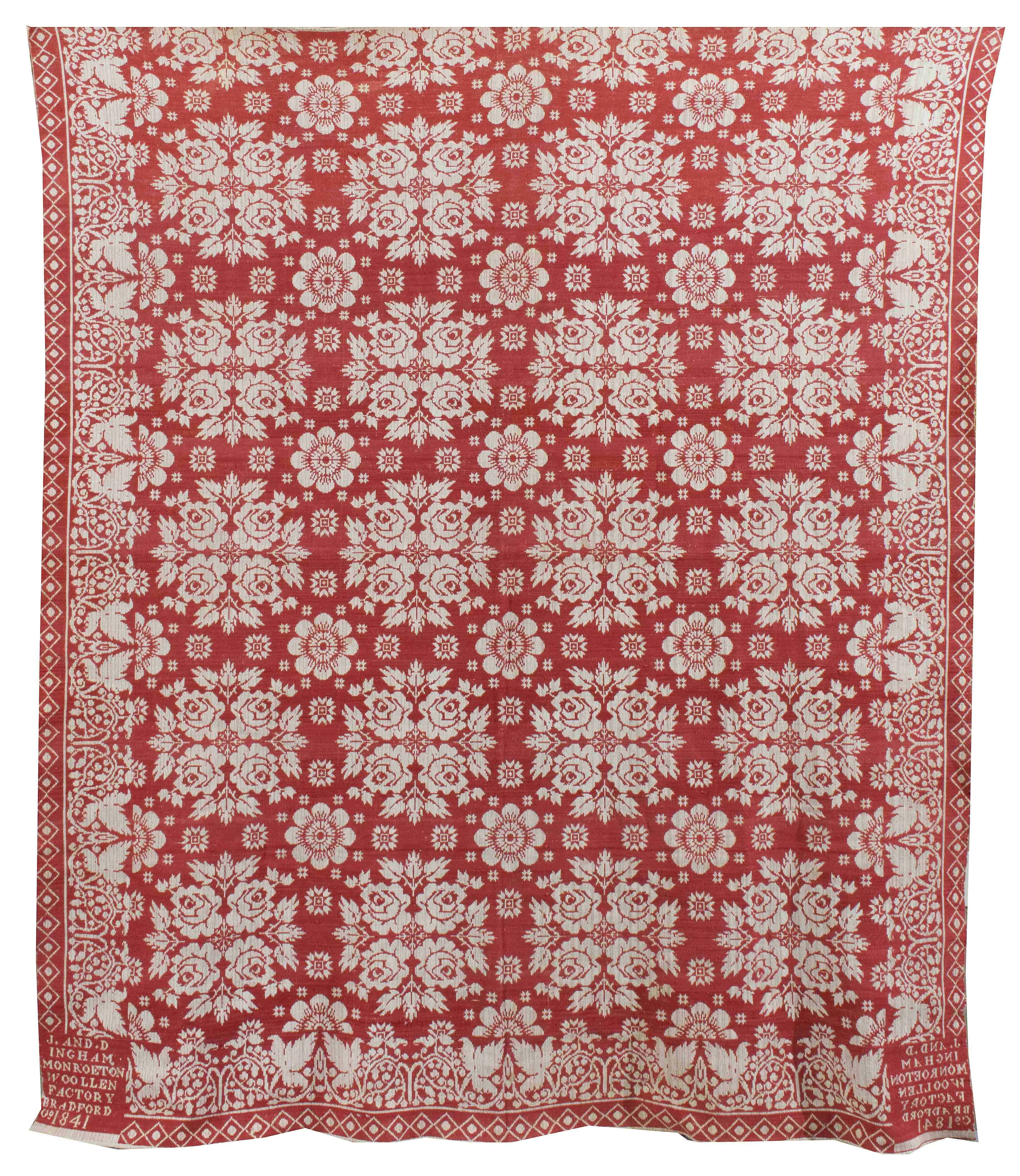 Appraisal: RED AND WHITE COTTON OVERSHOT COVERLET In a floral pattern