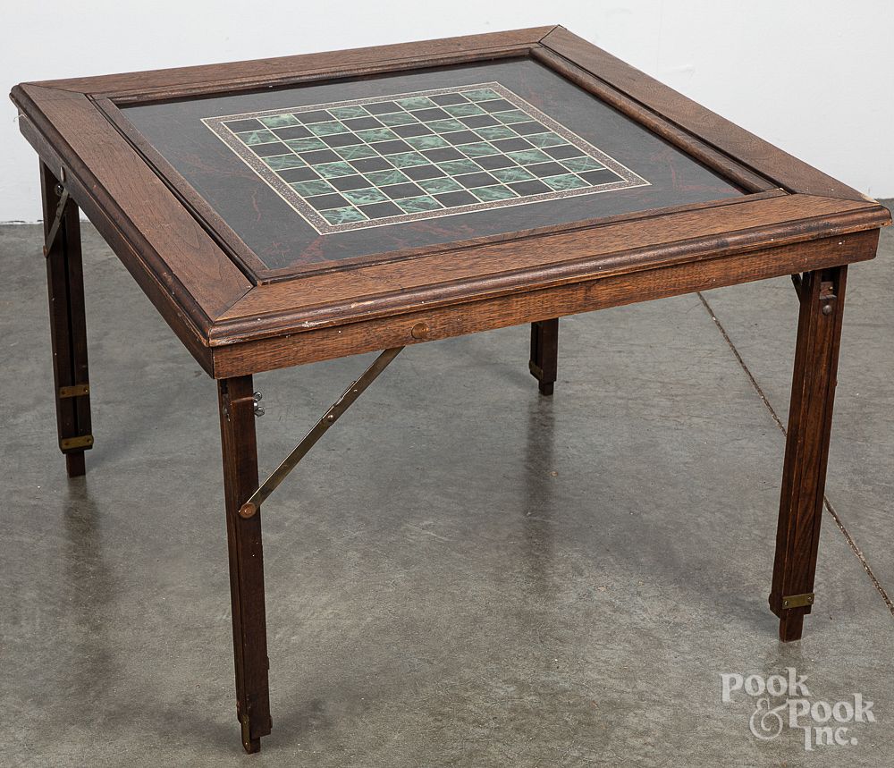 Appraisal: Walnut folding table with gameboard top Walnut folding table with