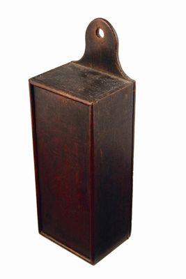 Appraisal: An early th century oak candle box with sliding cover