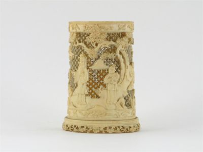 Appraisal: A small Chinese ivory brushpot the reticulated sides finely carved