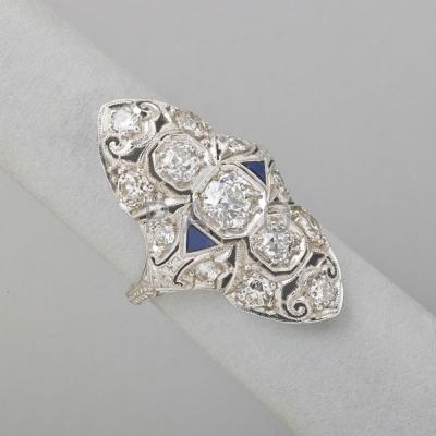 Appraisal: ART DECO DIAMOND PLATINUM NAVETTE RING Pierced and millgrained with