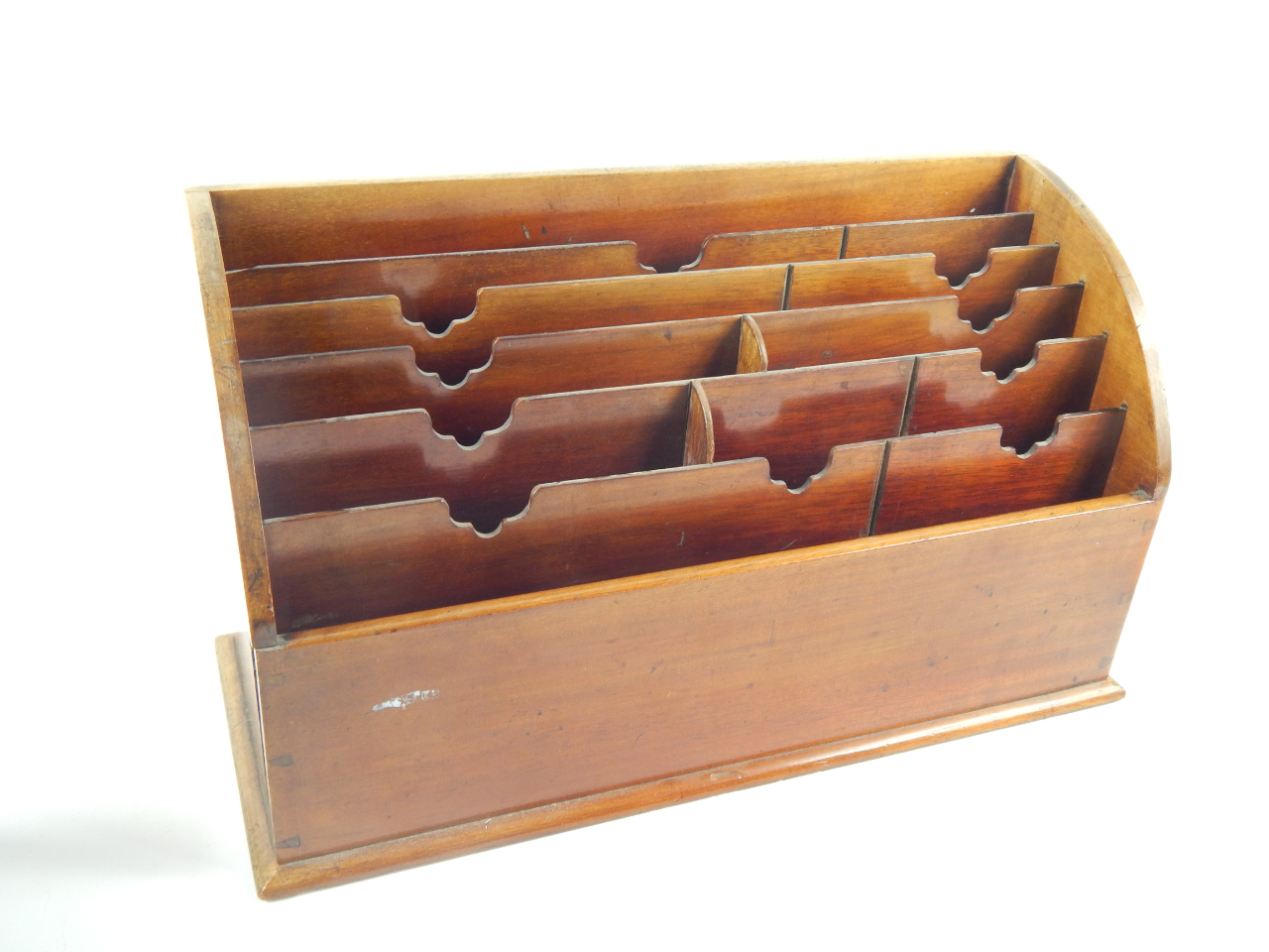 Appraisal: An Edwardian mahogany six division stepped stationery rack cm x