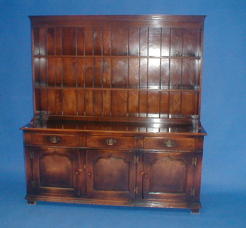 Appraisal: A quality reproduction oak dresser with plate rack