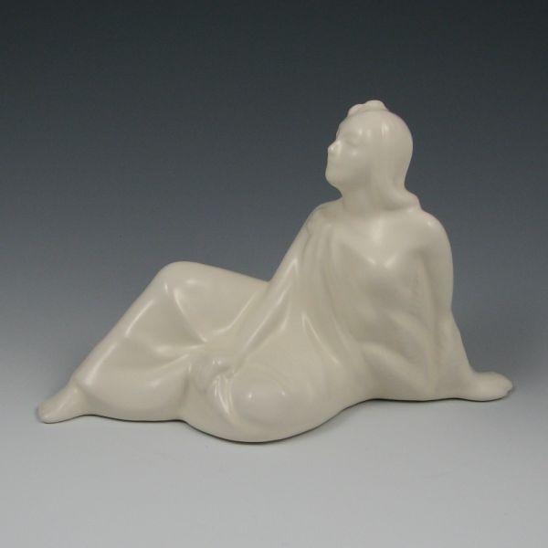 Appraisal: Reclining female pottery figure Marked Made in USA Mint tall