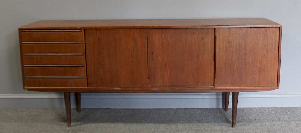 Appraisal: MIDCENTURY Teak Sliding Door Cabinet With Drawers From a New