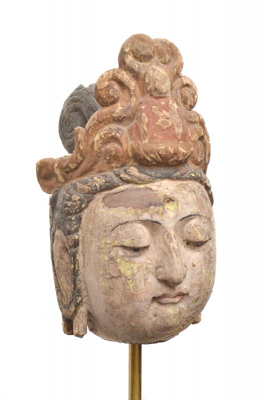 Appraisal: A CHINESE CARVED POLYCHROME WOODEN HEAD OF A BODHISATTVA MING