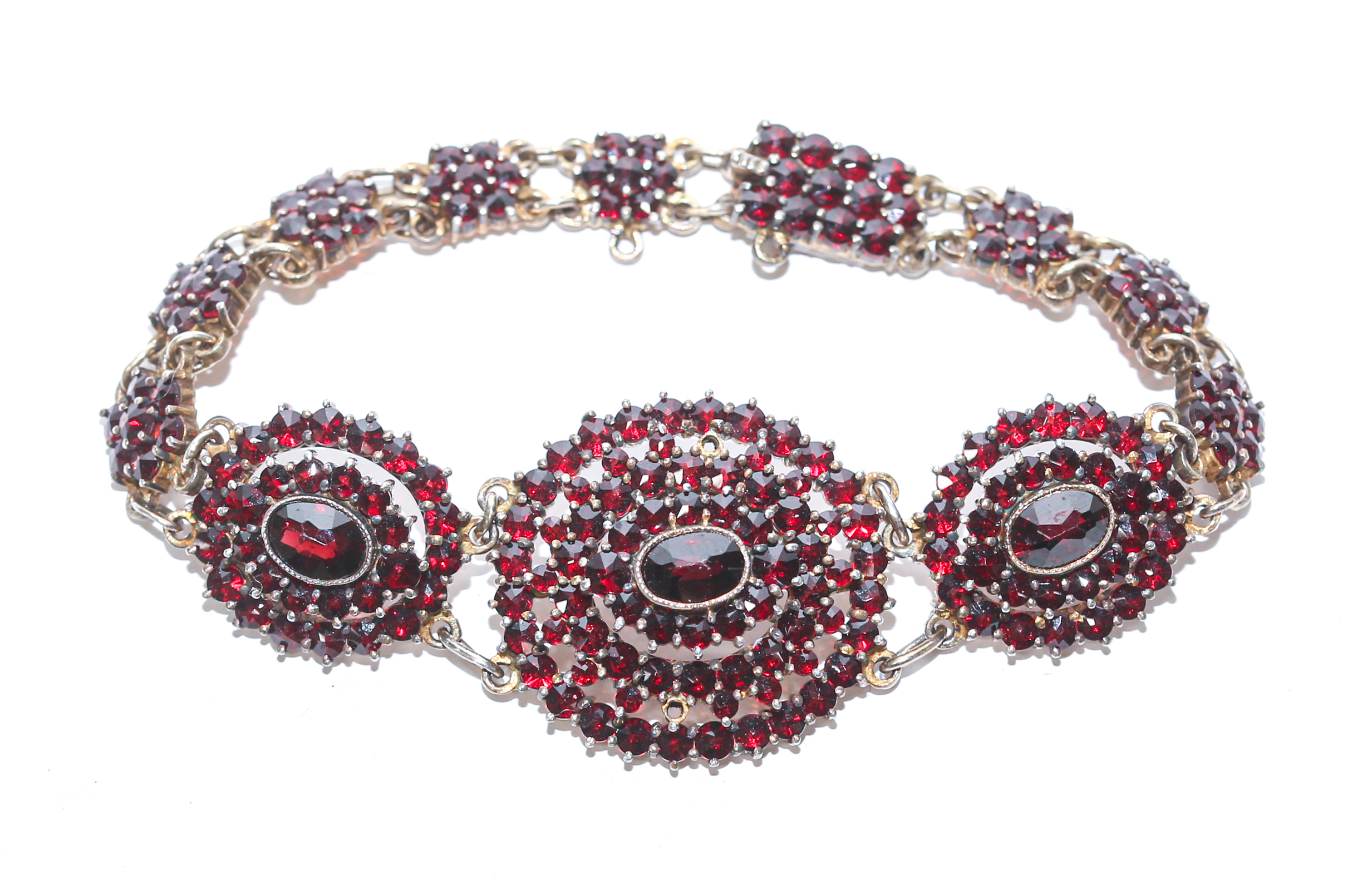 Appraisal: GILT BOHEMIAN GARNET CLUSTER BRACELET in L