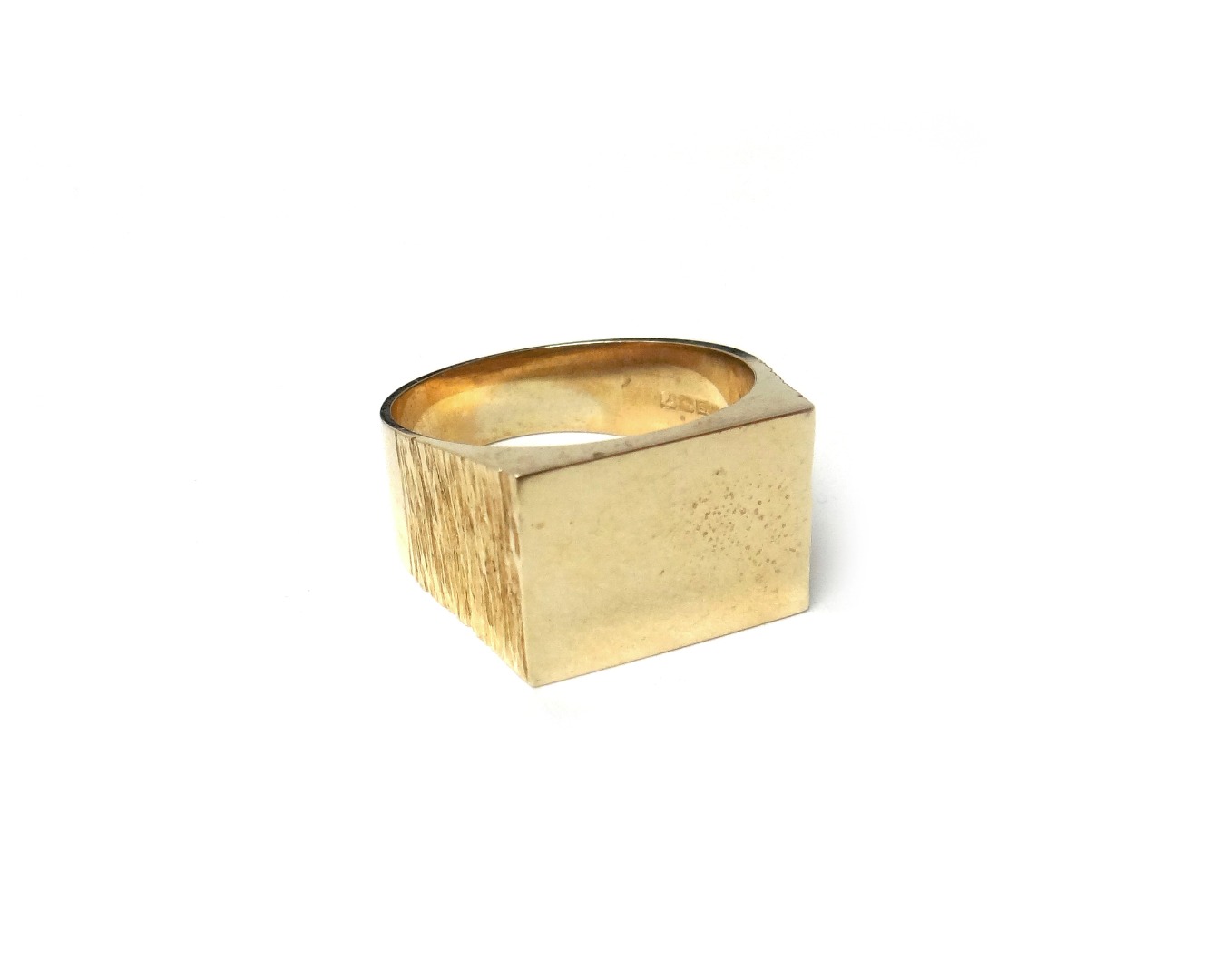 Appraisal: A ct gold gentleman's rectangular signet ring having bark textured