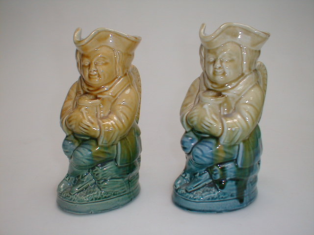 Appraisal: Two majolica glazed Toby Jugs high