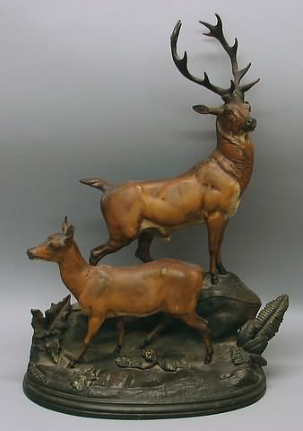 Appraisal: By Hippolyte Heizler - male and female deer on rocky