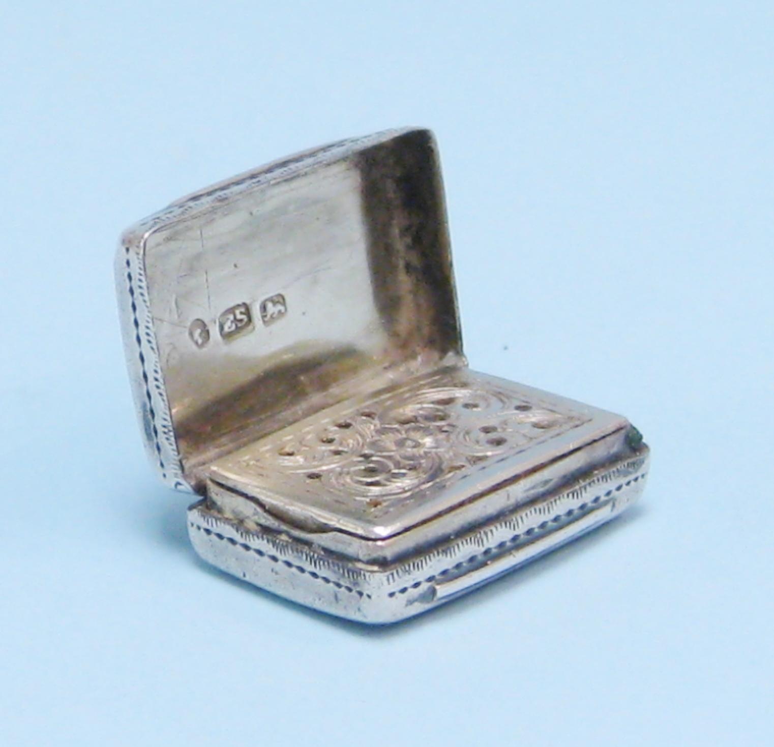 Appraisal: A Victorian small rectangular Vinaigrette leafage engraved with vacant cartouche