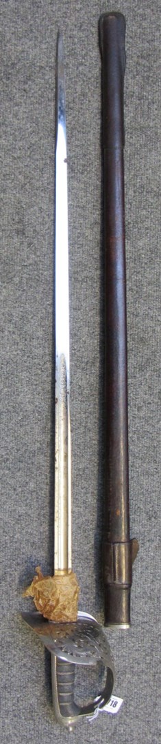 Appraisal: A Georgian officer's sword with straight engraved blade pierced basket