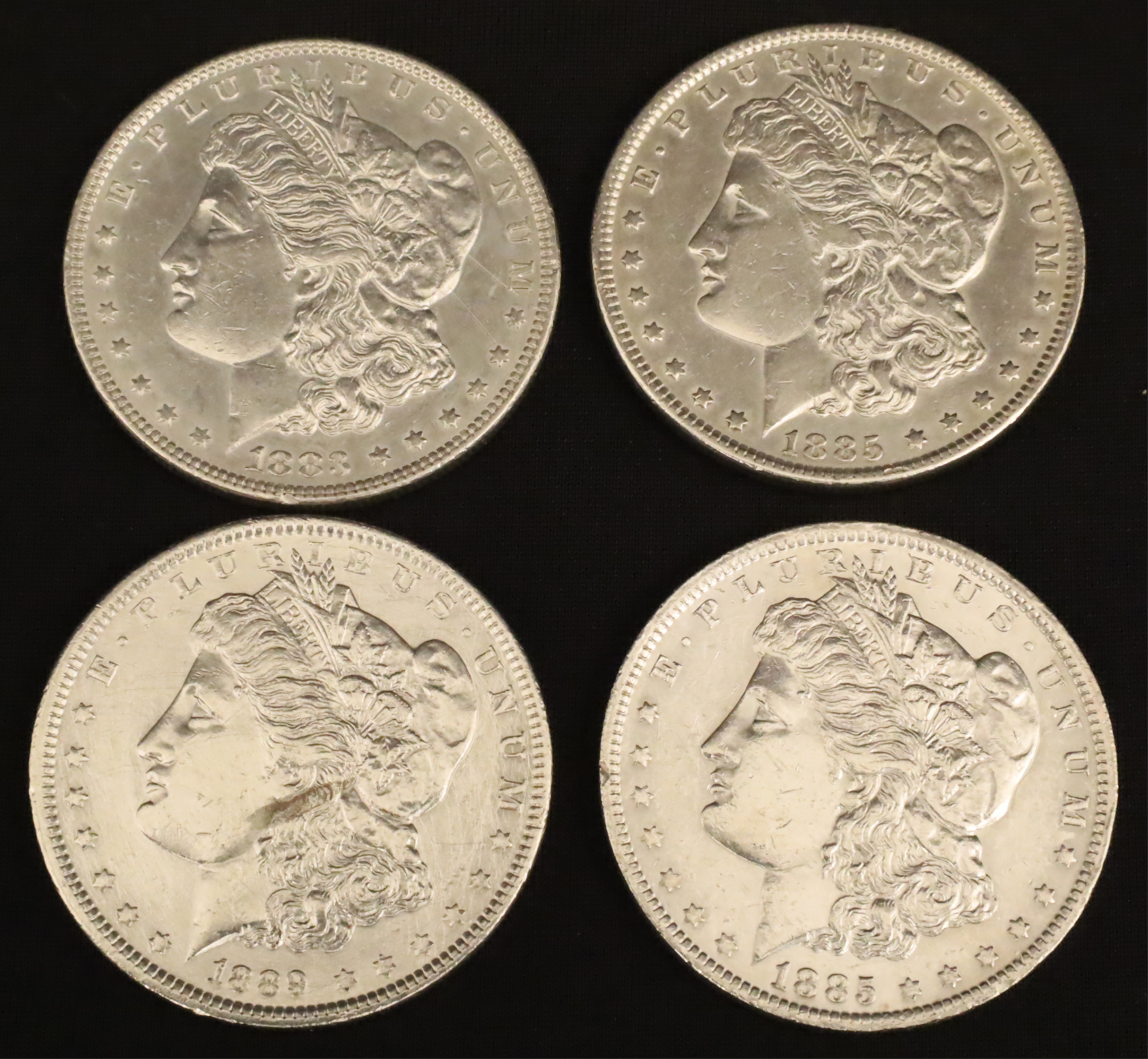 Appraisal: FOUR PRE- HIGH QUALITY MORGAN SILVER DOLLARS Group of Pre-