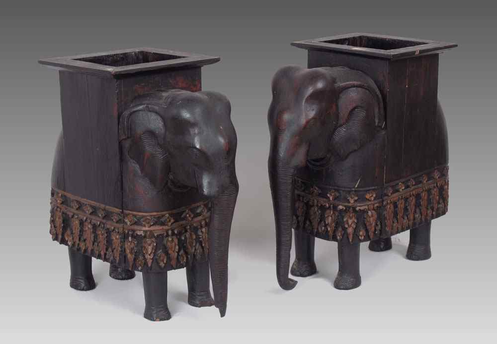 Appraisal: PAIR OF CARVED WOOD ELEPHANT PLANT STANDS Carved figural elephant