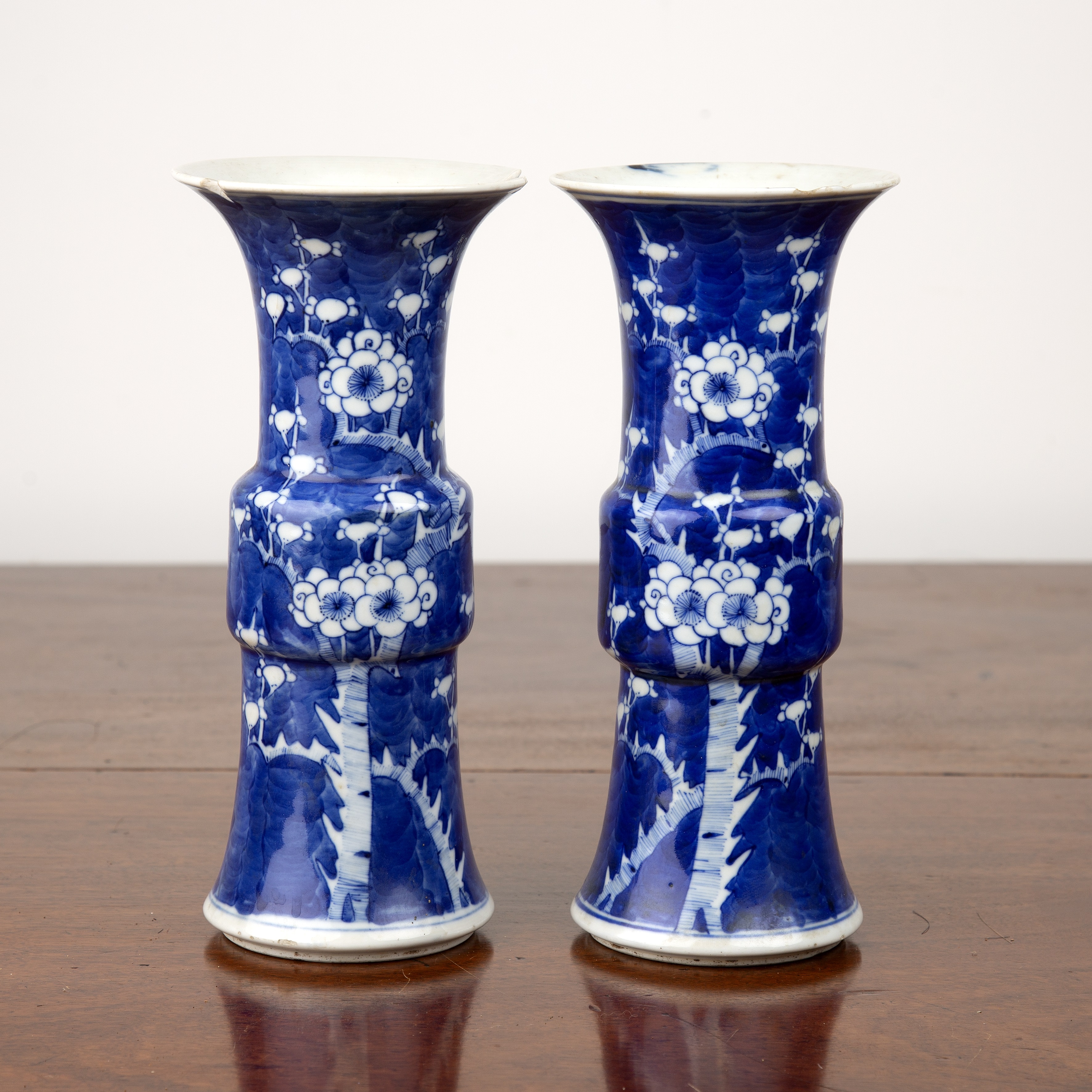 Appraisal: Pair of blue and white porcelain Gu-shaped vasesChinese th Century