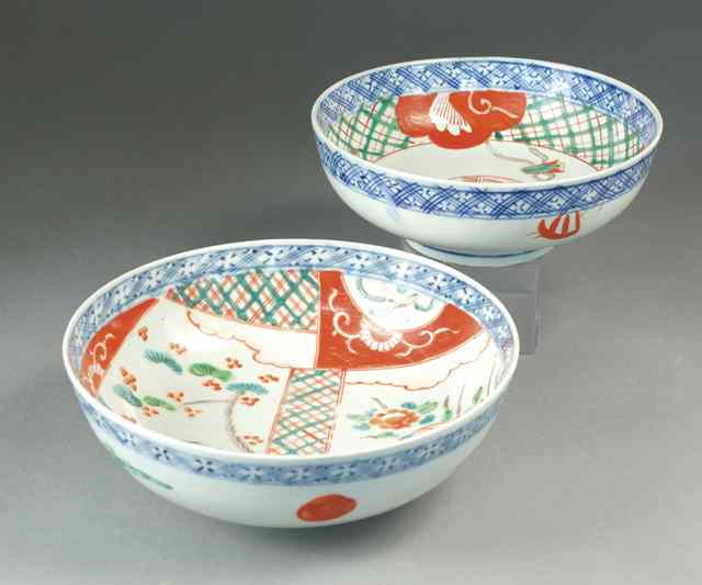 Appraisal: TWO NISHIKI-DE JAPANESE IMARI SERVING BOWLS Both hand painted over