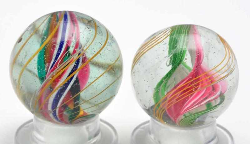 Appraisal: Lot of Swirl Marbles Description The smaller marble is a