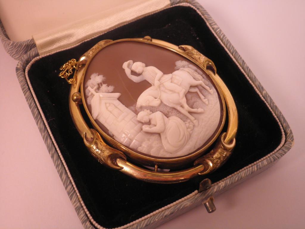 Appraisal: A thC cameo carved with a gentleman on horseback beside