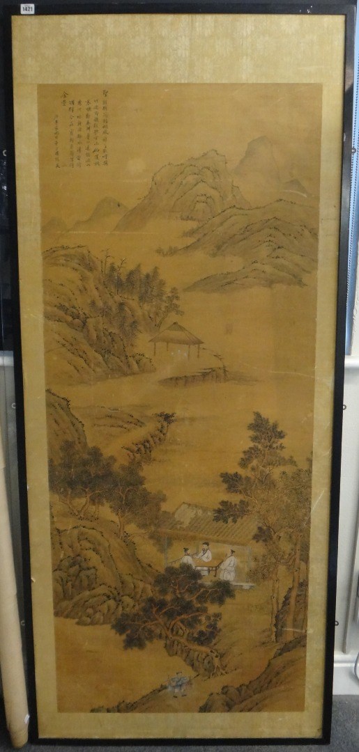 Appraisal: A Chinese painting of scholars within a mountain landscape th