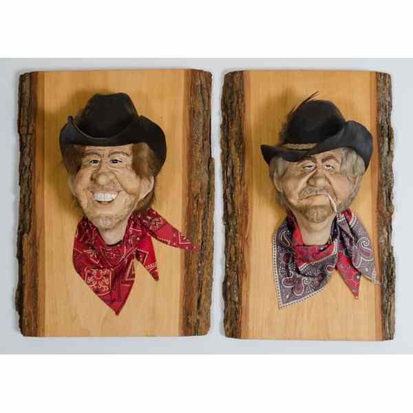 Appraisal: Chris Warren Sculptures of Mounted Cowboy Heads Two carved wooden