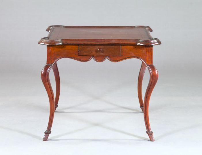 Appraisal: French Provincial-Style Mahogany Games Table the square top with turreted