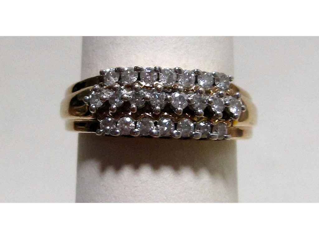 Appraisal: Nine carat gold triple row diamond cluster ring with brilliant