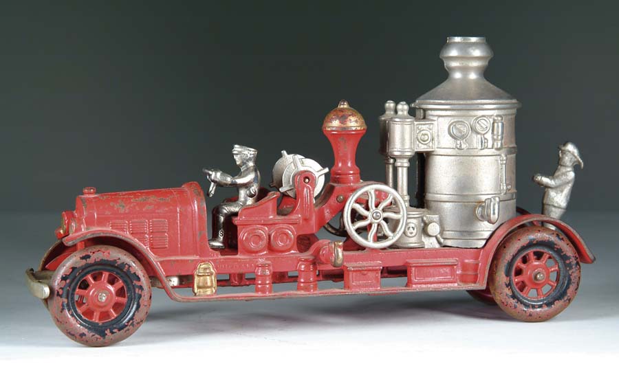 Appraisal: KENTON AUTOMOTIVE PUMPER Desirable pumper with cast iron spoked wheels