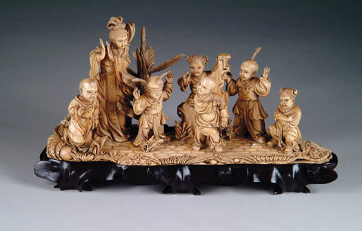 Appraisal: GOOD IVORY FIGURAL GROUP The ivory carving has six children