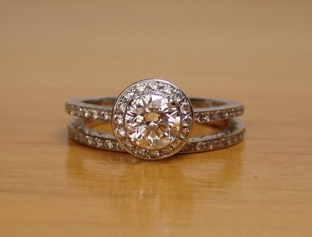 Appraisal: DIAMOND AND FOURTEEN KARAT GOLD WEDDING RING SET with a