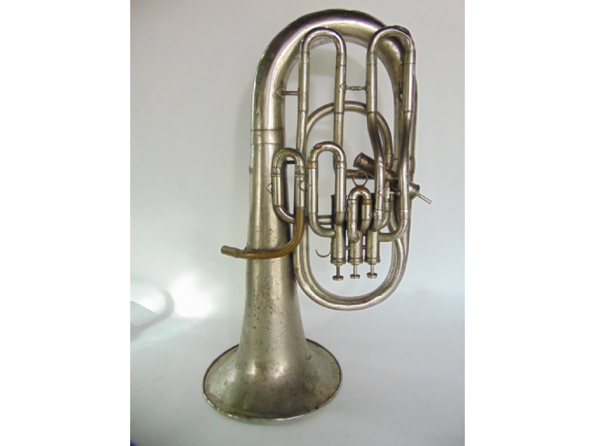 Appraisal: An antique French silver plated four valve euphonium cm long