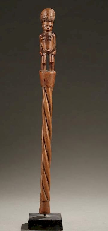 Appraisal: Lunda staff with female figure A staff with twist carved