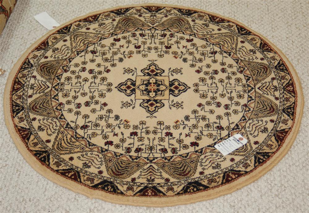 Appraisal: THREE SMALL ROUND ORIENTAL STYLE RUGS