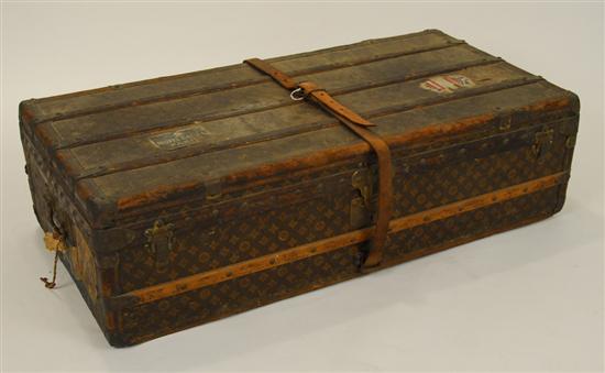 Appraisal: LOUIS VUITTON LIFT TOP TRUNK with roller wheels brass handles