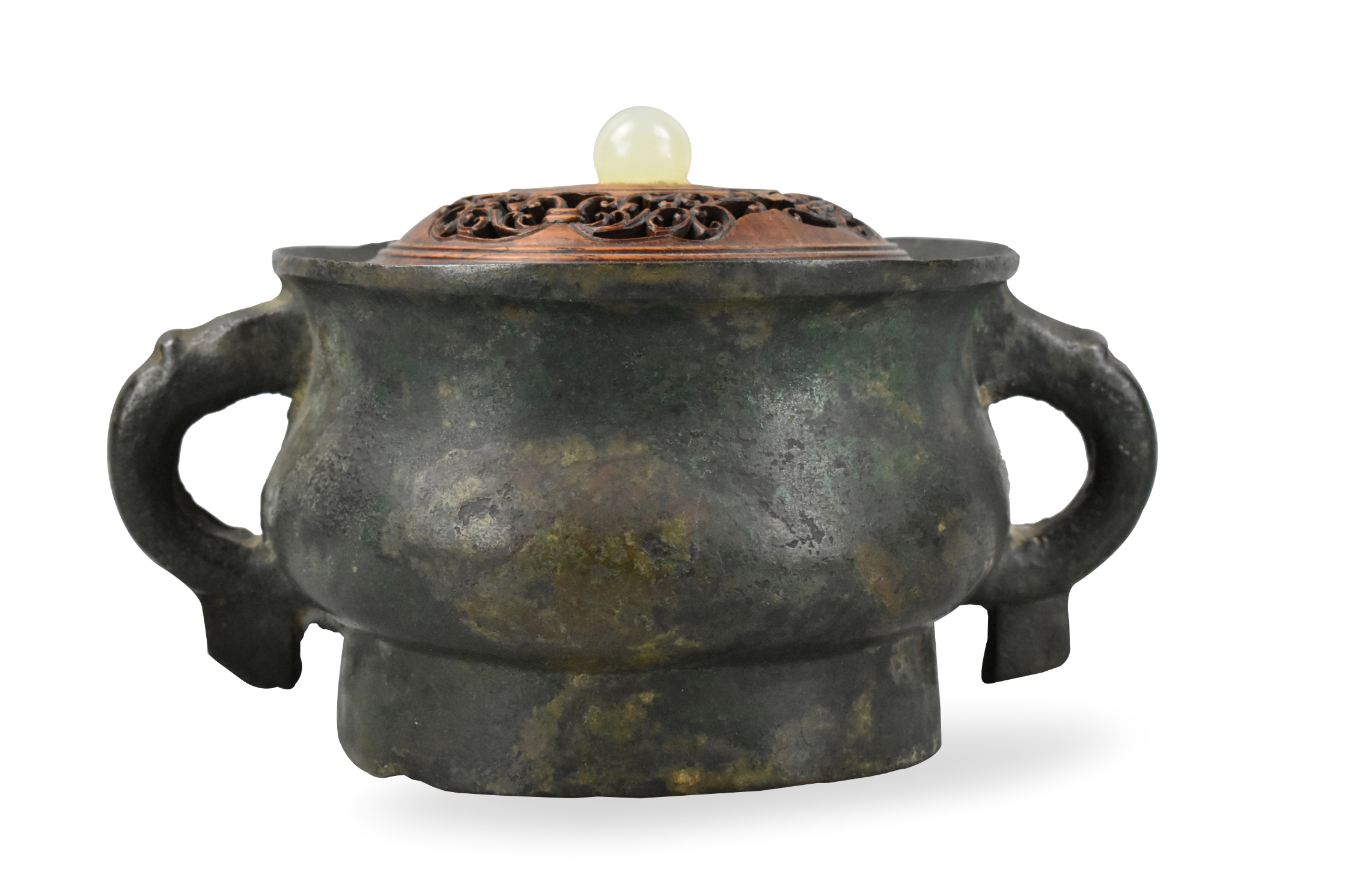 Appraisal: An ancient Chinese bronze censer with carved wooden cover dating