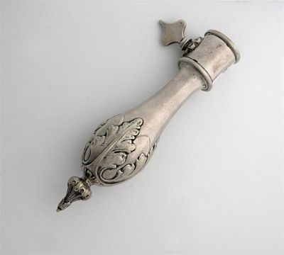 Appraisal: A late Victorian plated hambone holder with foliate decoration in