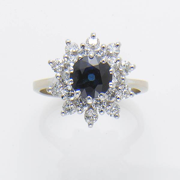 Appraisal: A sapphire diamond and k white gold ring estimated sapphire