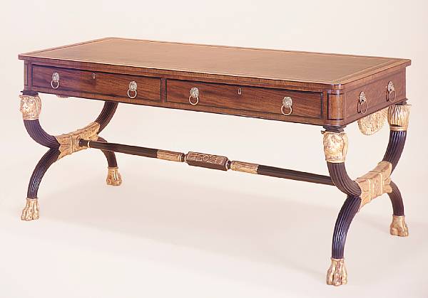 Appraisal: A Regency style parcel gilt and ebonized mahogany writing table