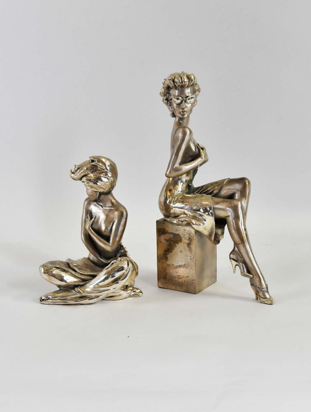 Appraisal: TWO SILVERED METAL CLAD FEMALE FIGURESItalian Signed indistinctly dated The