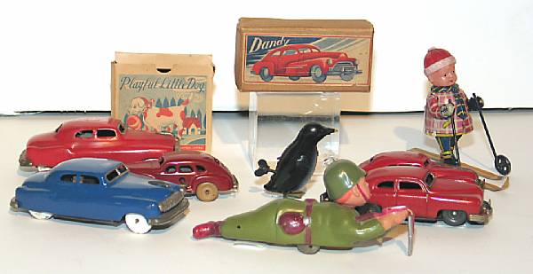 Appraisal: Occupied Japanese toys Desirable tin lithographed toys marked Occupied Japan