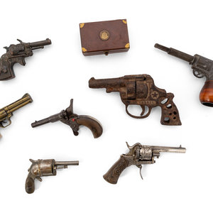 Appraisal: A Group of Eight Miniature Firearms Related Accoutrements th th