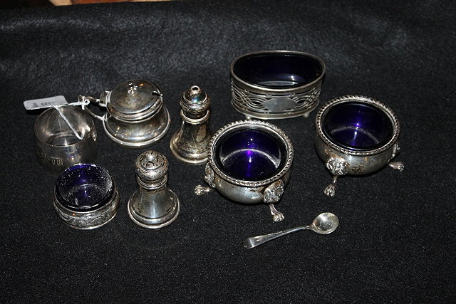 Appraisal: A COLLECTION OF SILVER CRUET ITEMS to include a mustard