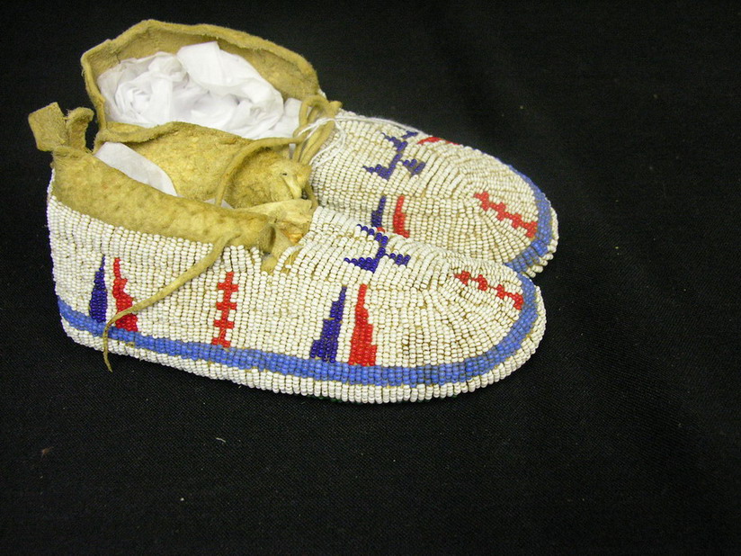 Appraisal: NATIVE AMERICAN CHILDS BEADED MOCCASINS Beaded on tops all over