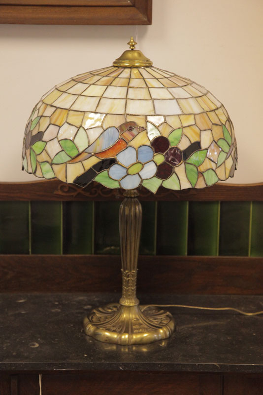 Appraisal: MILLER LEADED GLASS TABLE LAMP Brass base with repeating floral