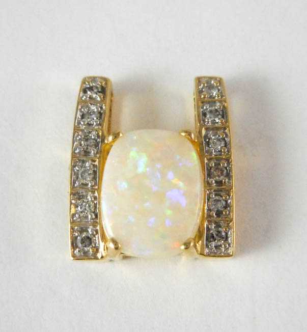 Appraisal: OPAL AND FOURTEEN KARAT GOLD SLIDE PENDANT with six round-cut