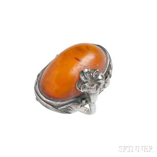 Appraisal: Silver and Amber Ring centering an amber cabochon within a