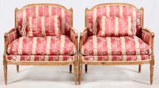 Appraisal: A PAIR OF LOUIS XVI-STYLE UPHOLSTERED COVERED WALNUT ARMCHAIRS H